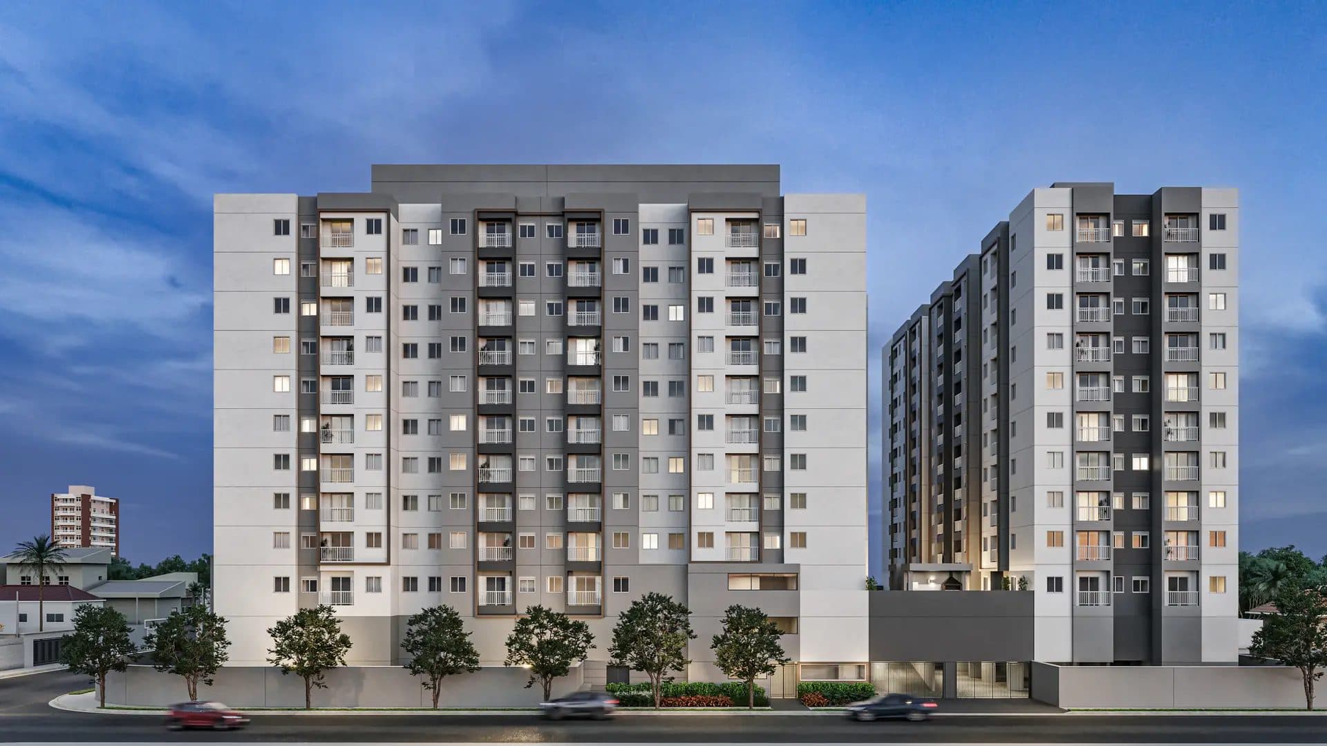 Fachada de condomínio residencial com dois blocos de apartamentos e paisagismo frontal.