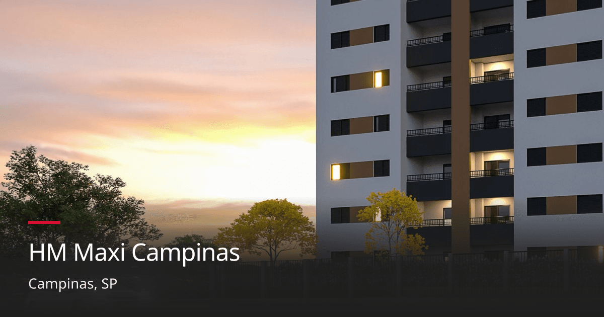 Detalhe da fachada de edifício residencial com varandas e iluminação noturna.